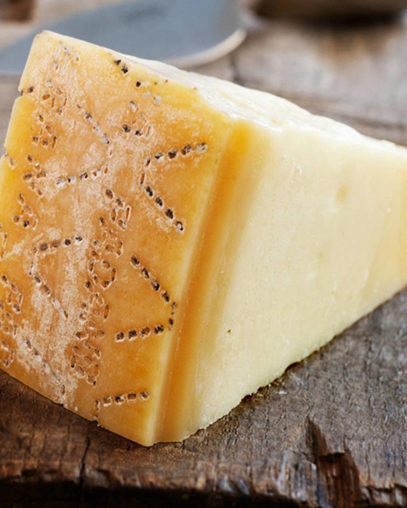 Grana Padano DOP - 1 kg 10 Monate gereift Grana Padano DOP - 1 kg 10 Monate gereift